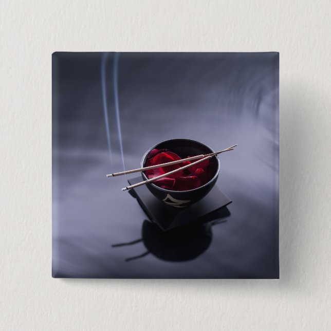 Burning incense on top of bowl of petals 15 cm square badge (Front)