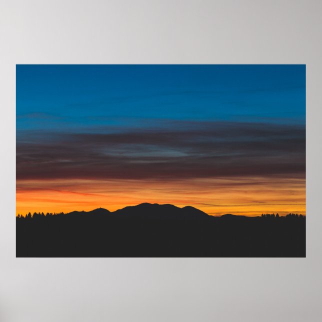 Burning sunset above landscape silhouette poster (Front)