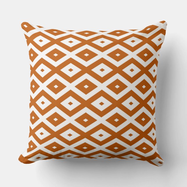 Burnt orange and white diamond pattern cushion (Front)