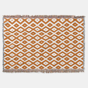 Burnt orange and white diamond pattern throw blanket