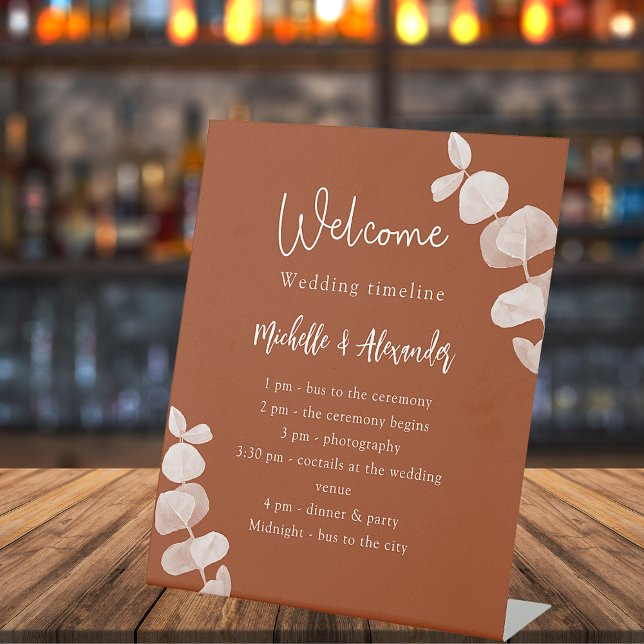 Burnt orange eucalyptus wedding program timeline pedestal sign (Creator Uploaded)