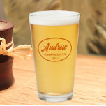 Burnt Orange Stylised Wedding Groomsman Name Glass<br><div class="desc">Beer glass for the wedding groomsman that features his name printed in a burnt orange colour, stylised script inside a burnt orange colour oval border along with wedding date. A great party supply idea for a bachelor party! Personalise your beer glass by editing and replacing name and date with your...</div>