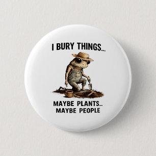Bury things maybe plants maybe people funny frog 6 cm round badge