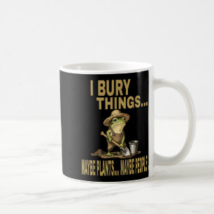 Bury things maybe plants maybe people funny frog coffee mug