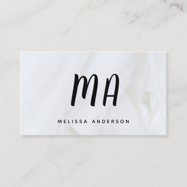Business card monogram and background. (Front)