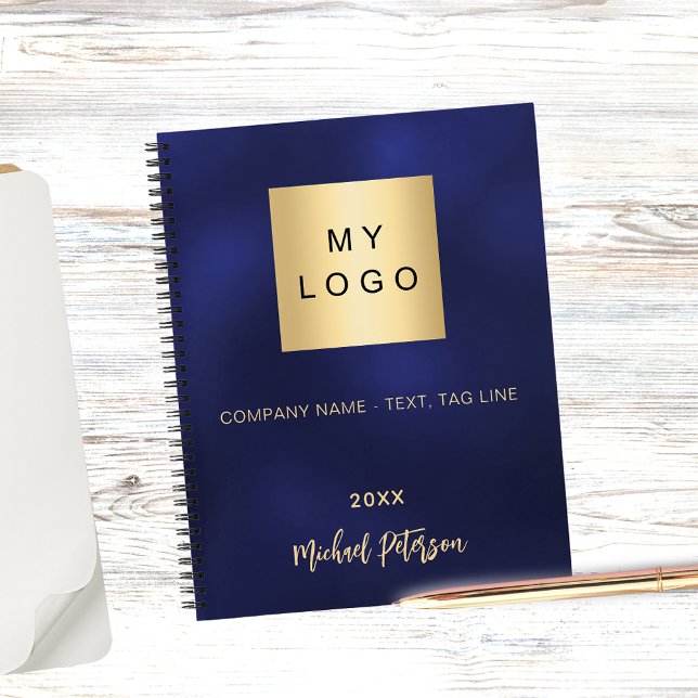 Business logo navy blue gold name year notebook (Creator Uploaded)