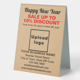 Business New Year Sale on Light Brown Table Sign