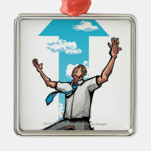 Businessman kneeling, arrow sign in the background metal tree decoration