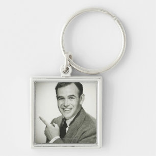 Businessman Pointing Key Ring