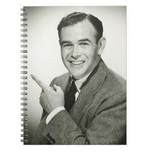 Businessman Pointing Notebook
