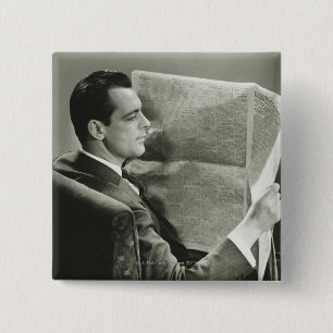 Businessman Reading the Newspaper 15 Cm Square Badge