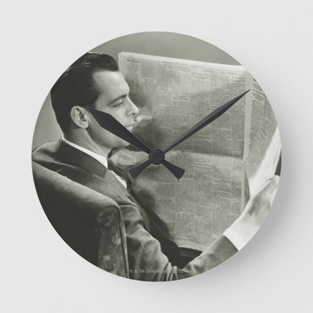 Businessman Reading the Newspaper Round Clock (Front)