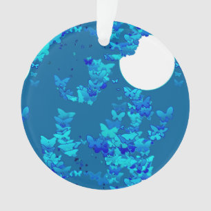 Butterflies against blue night sky, moonscape ornament