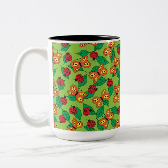 Butterflies and Ladybugs on green leaves Two-Tone Coffee Mug (Left)