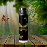 Butterflies black gold name script water bottle<br><div class="desc">Faux gold butterflies on a black background.  Personalise and add your name.</div>