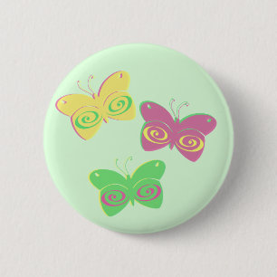 Butterflies on light green background 6 cm round badge