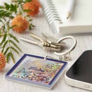 Butterfly dragonfly and flowers personalised key ring