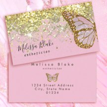 butterfly logo on faux gold sparkle