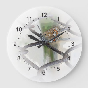 butterfly on fence large clock