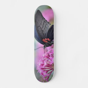 Butterfly on flower skateboard