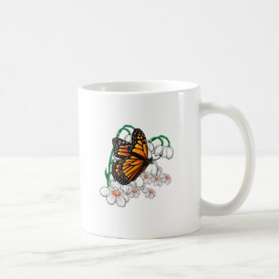 Butterfly on flowers coffee mug