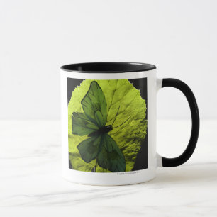 Butterfly on leaf mug