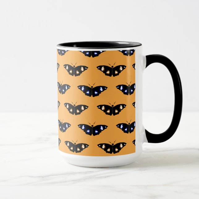 Butterfly pattern on orange background mug (Right)