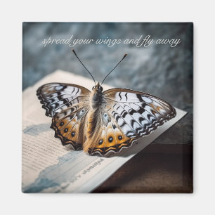 Butterfly sitting on open book magnet
