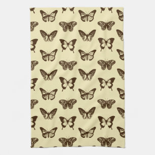 Butterfly sketch, chocolate brown on beige tea towel