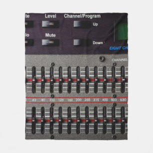 Buttons on a sound mixer in a recording studio. fleece blanket