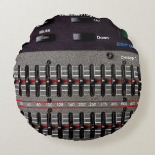 Buttons on a sound mixer in a recording studio. round cushion