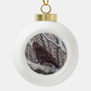 Buzzard on a Snowy Branch Ceramic Ball Christmas Ornament