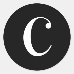 C monogram, white text on black classic round sticker