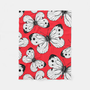 Cabbage butterfly pattern on red fleece blanket
