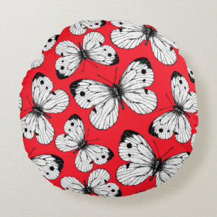 Cabbage butterfly pattern on red round cushion