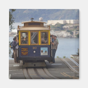 Cable car chugs up Hyde Street in San Magnet