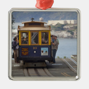 Cable car chugs up Hyde Street in San Metal Ornament