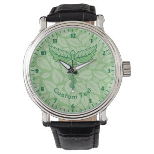 Caduceus with Leaves Background Wristwatch