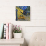 Café Terrace by Vincent Van Gogh  Square Wall Clock<br><div class="desc">This painting of a colourful outdoor view is a picturesque work, the vision of a relaxed spectator who enjoys the charm of his surrounding without any concern. It recalls Van Gogh's mood when he wrote that "the night is more alive and more richly coloured than the day." The yellow of...</div>