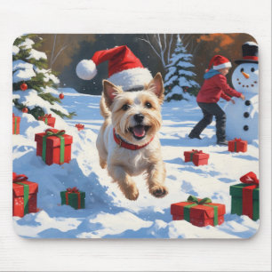 Cairn Terrier Running in Snow with Christmas Hat Mouse Pad