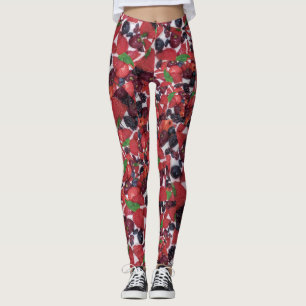 Cake topped with a variety of fresh berries leggings