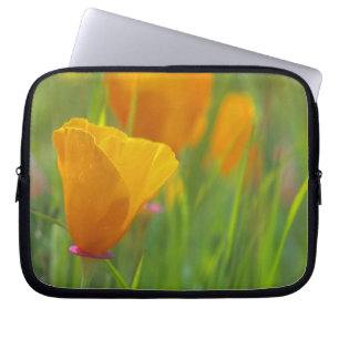 California golden poppies in a green field laptop sleeve
