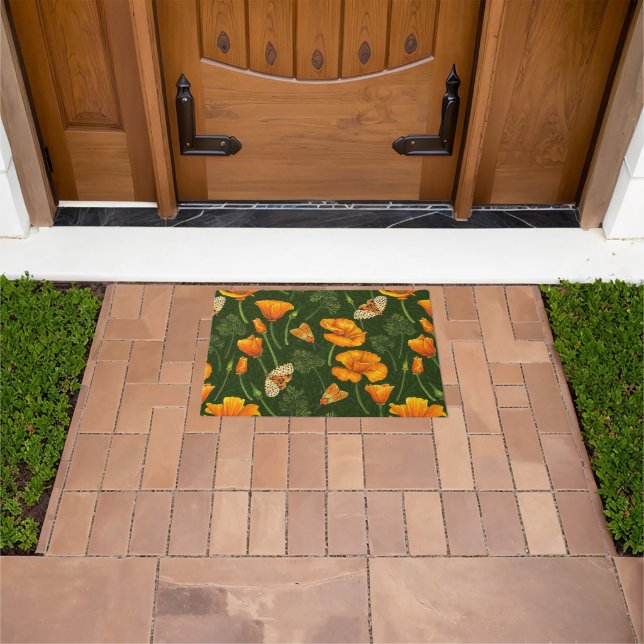 California poppies and moths on dark green doormat (Outdoor)