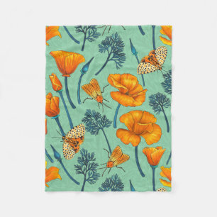 California poppies and moths on jade fleece blanket