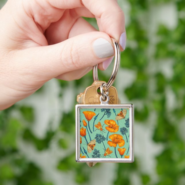 California poppies and moths on jade key ring (Hand)