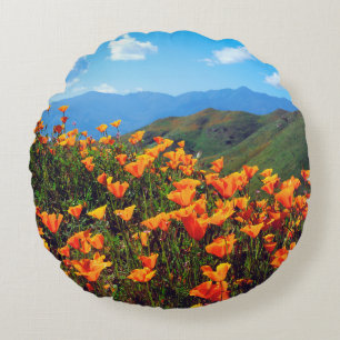 California poppies covering a hillside round cushion
