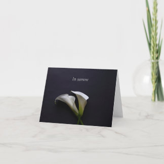 Calla lilies on a dark background card