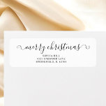 Calligraphy Merry Christmas White Return Address Label<br><div class="desc">Add a festive touch to your holiday correspondence with this elegant return address label. The heading "Merry Christmas" is beautifully crafted in fancy calligraphy, bringing a sense of warmth and celebration to each envelope. Below the greeting, your name and address are clearly displayed in an elegant serif font, ensuring your...</div>