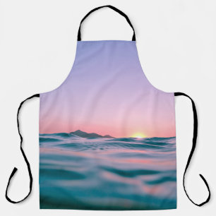 Calm body of water during golden hour apron