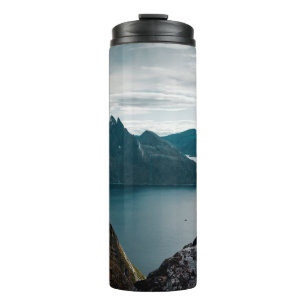 CALM BODY OF WATER NEAR MOUNTAIN THERMAL TUMBLER